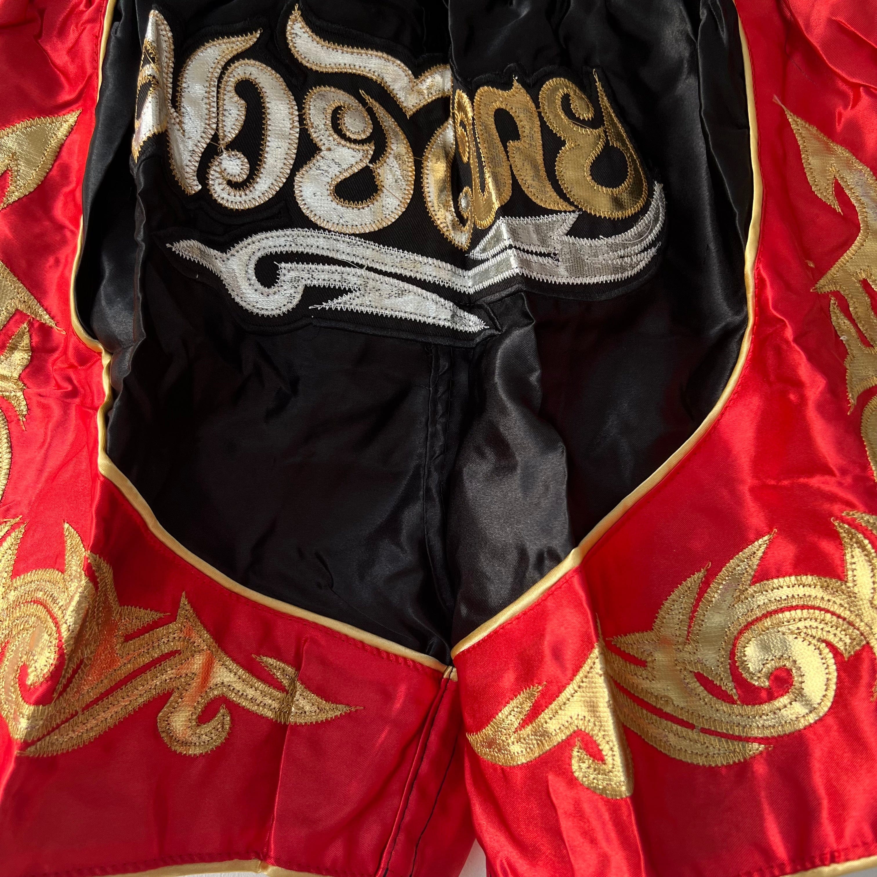 Muay Thai Boxing Shorts for Adult good - Red and Black Side with Gold Thai Pattern Stripes